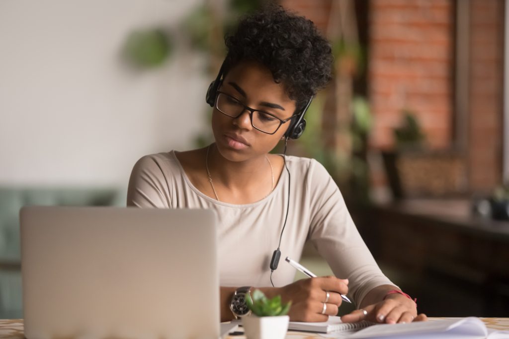 Online student studying in one of the online colleges in Virginia. 